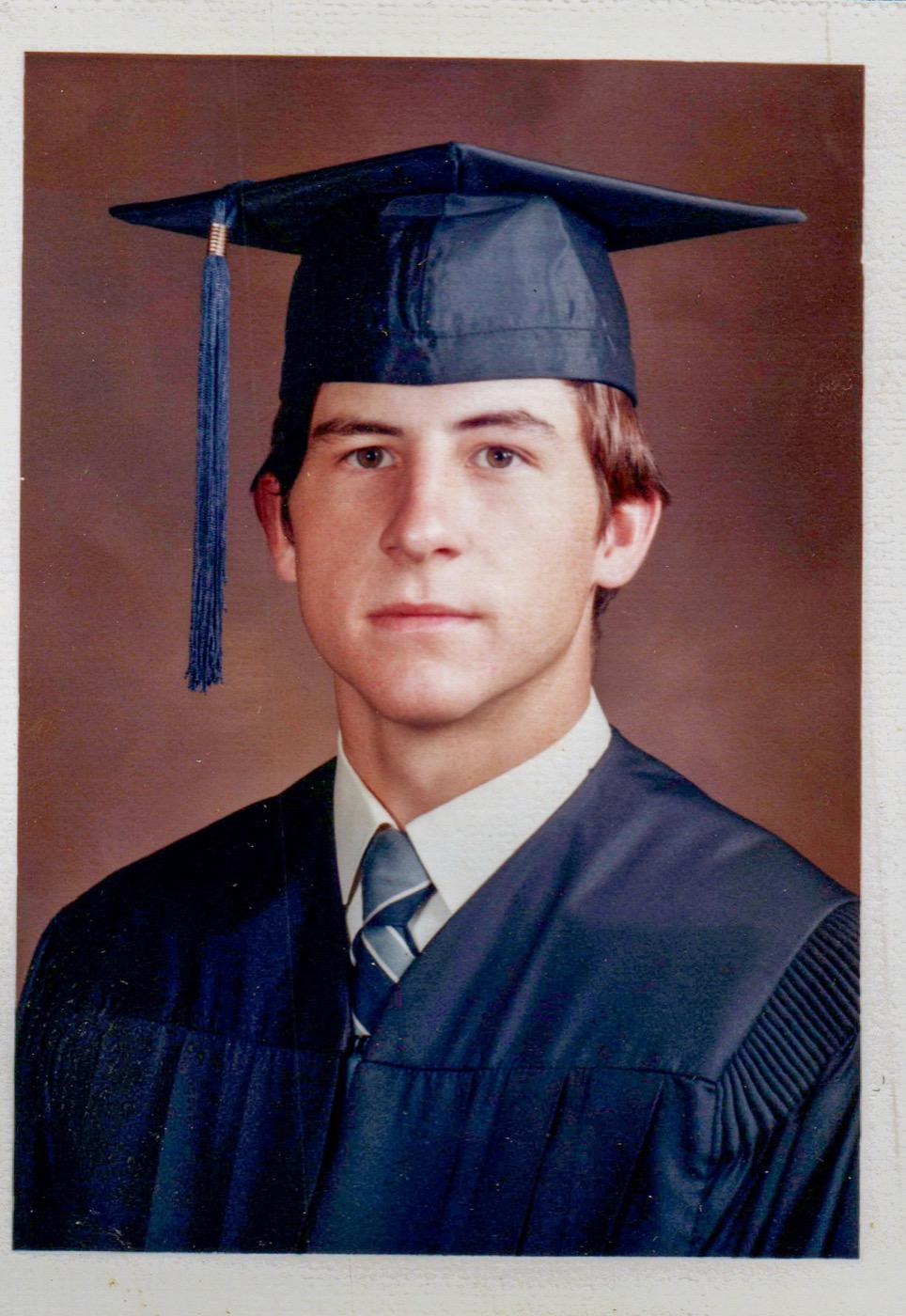 Tom's high school graduation portrait